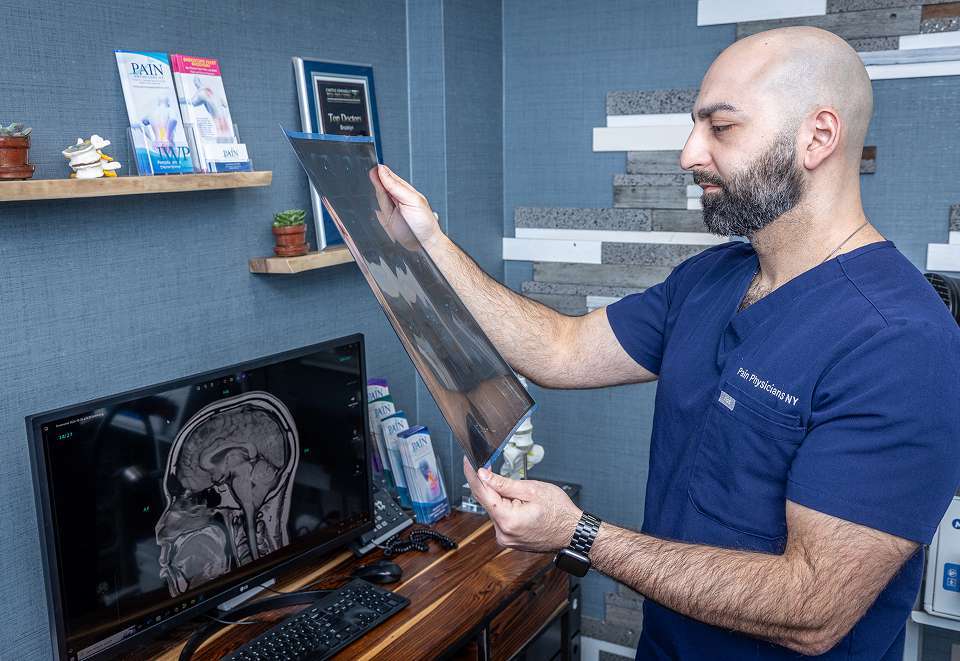 Stem Cell Therapy | Doctor Checking Patients MRI Reports